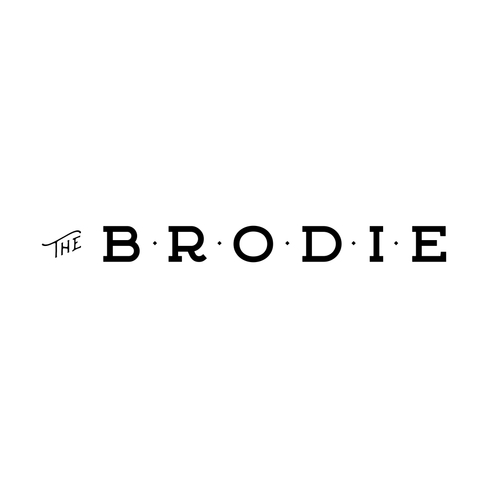 A black and white image with the word "The Brodie" written in a stylized font.